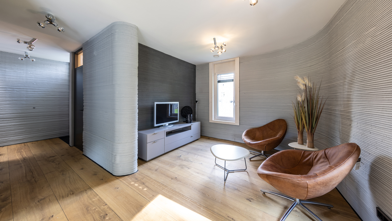 Wohnzimmer in Deutschlands erstem Haus aus dem 3D-Drucker.