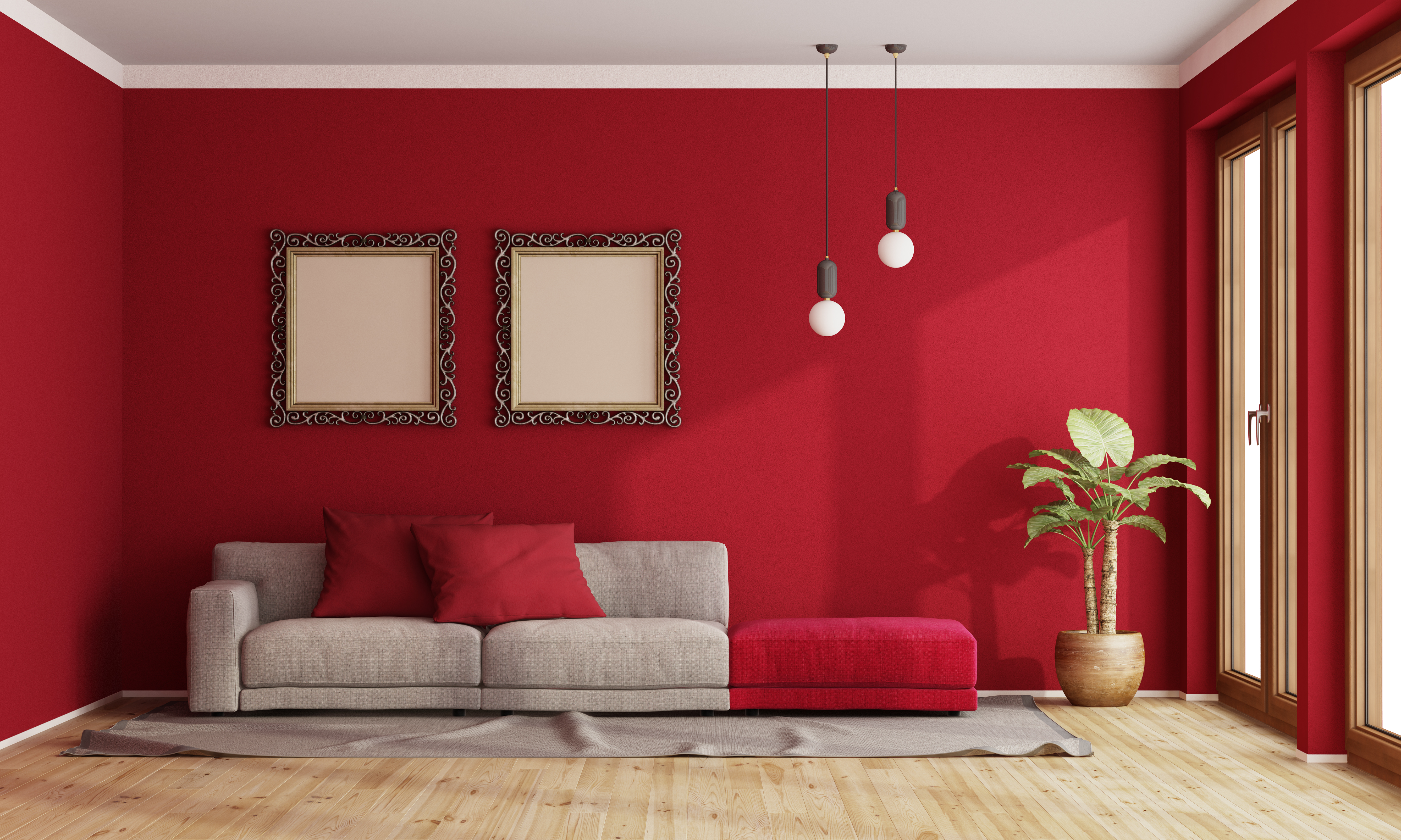 Rote Wohnzimmerwand mit grau-roter Couch