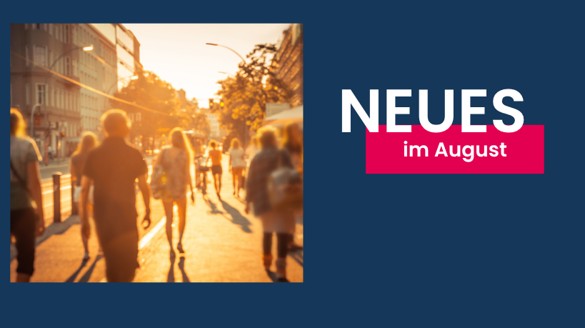 Eine Gruppe von Fußgängern läuft im gleißenden Licht des Sonnenuntergangs durch die Straßen einer belebten Stadt.