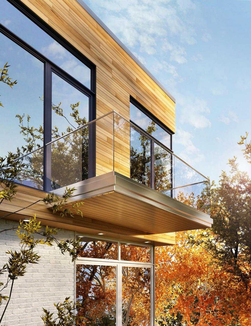 Balkongeländer aus Glas: Balkon mit Glasbrüstung an einem modernen Haus