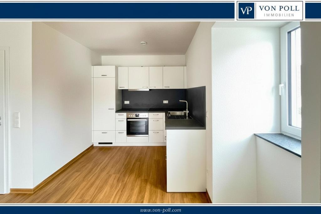 Exklusiver Erstbezug Neubau: Vollständig barrierefreie 2-Zimmer-Wohnung mit Balkon und Stellplatz - Foto 1