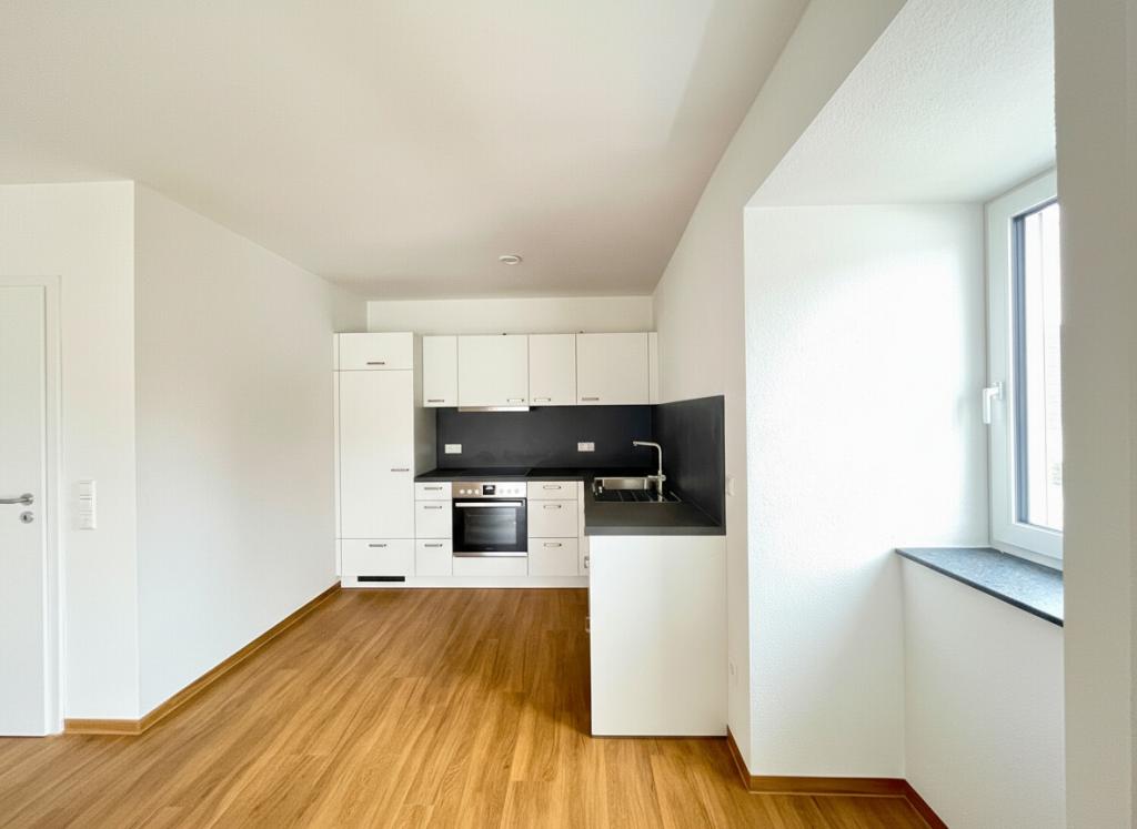 Exklusiver Erstbezug Neubau: Vollständig barrierefreie 2-Zimmer-Wohnung mit Balkon und Stellplatz - Foto 2