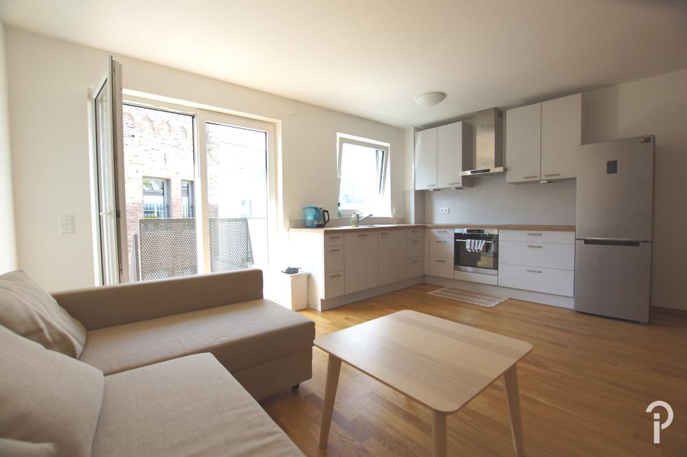 Teilmöblierte 2 Zimmer-Wohnung mit großer Sonnenterrasse, EBK und Tiefgarage in Meerbusch-Büderich - Photo 4