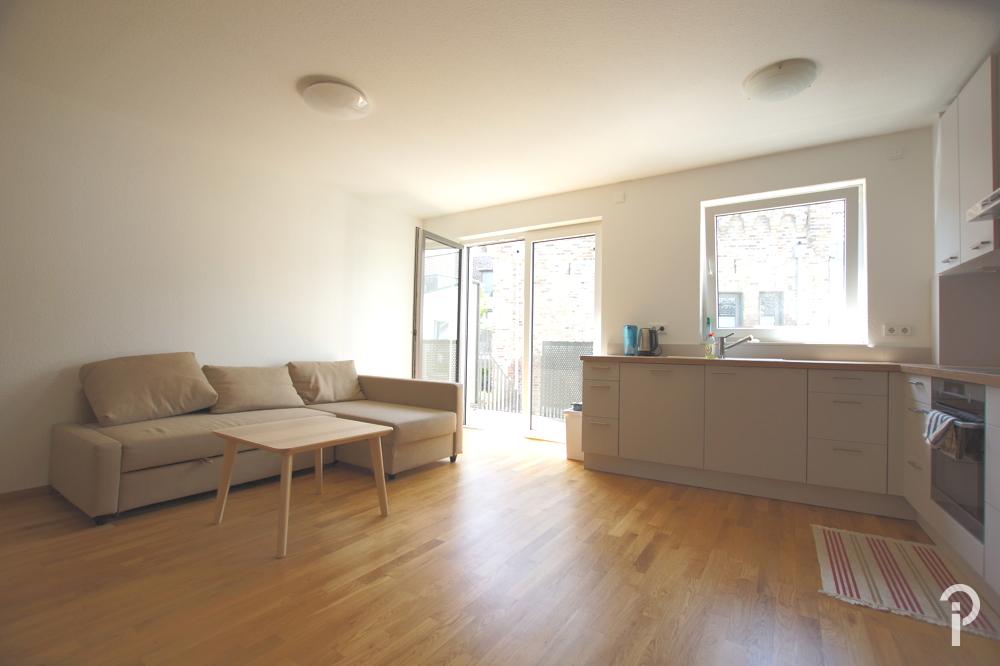 Teilmöblierte 2 Zimmer-Wohnung mit großer Sonnenterrasse, EBK und Tiefgarage in Meerbusch-Büderich - Photo 2