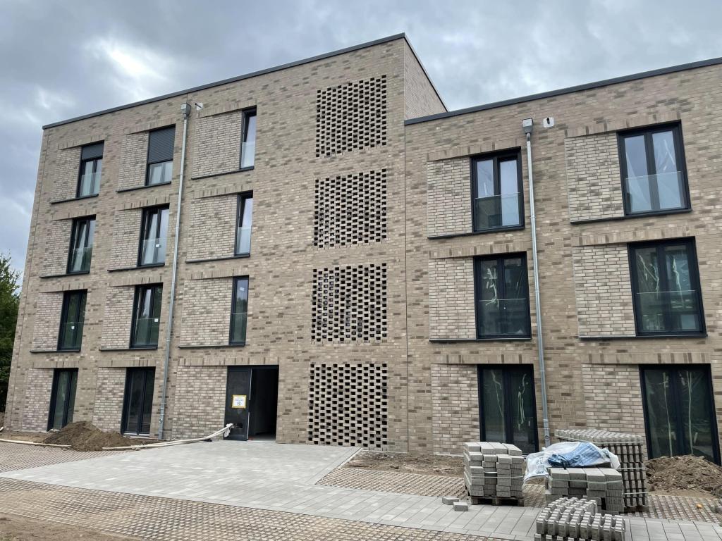 Erstbezug: Moderne 2-Zimmer-Wohnung im 2. OG mit Balkon, Einbauküche & Fußbodenheizung auf 66,5 m² - Jetzt schnell sein! - Photo 5