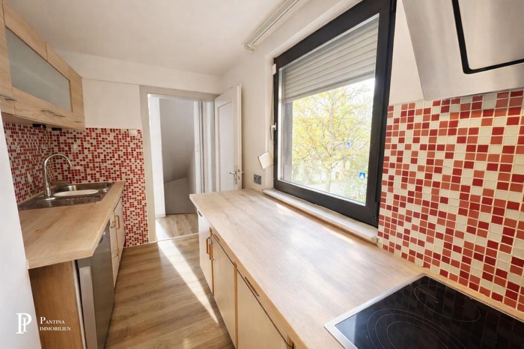 Charmantes Haus mit Garten, Garage & viel Platz auf 3 Etagen - Photo 5