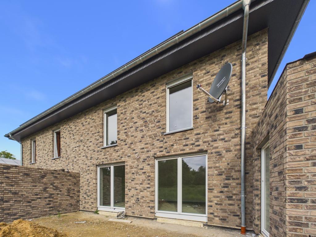 Energieeffizientes Neubauhaus mit Garage und Garten in ruhiger Wohnlage von Langbroich! - Photo 4
