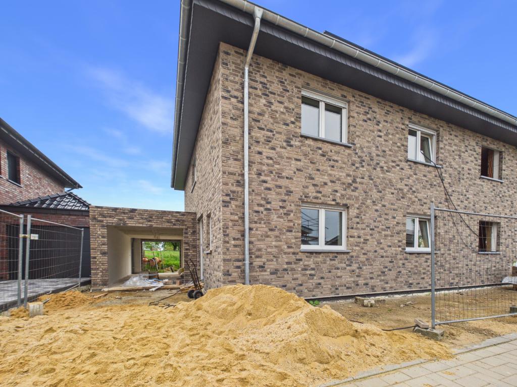 Energieeffizientes Neubauhaus mit Garage und Garten in ruhiger Wohnlage von Langbroich! - Foto 5
