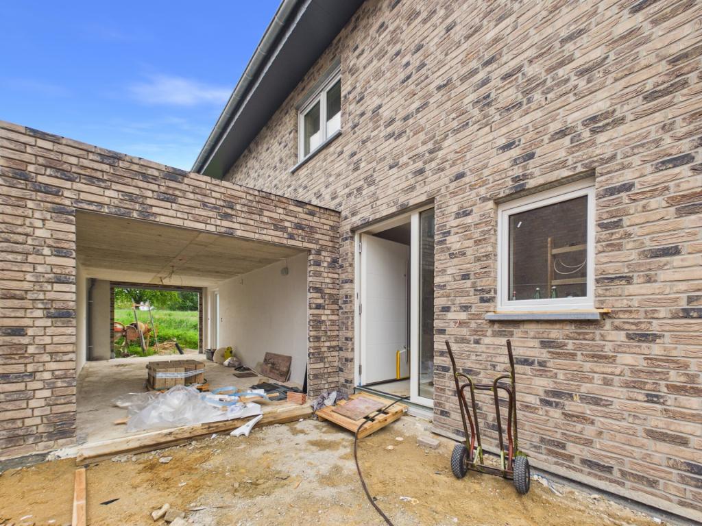 Energieeffizientes Neubauhaus mit Garage und Garten in ruhiger Wohnlage von Langbroich! - Foto 2