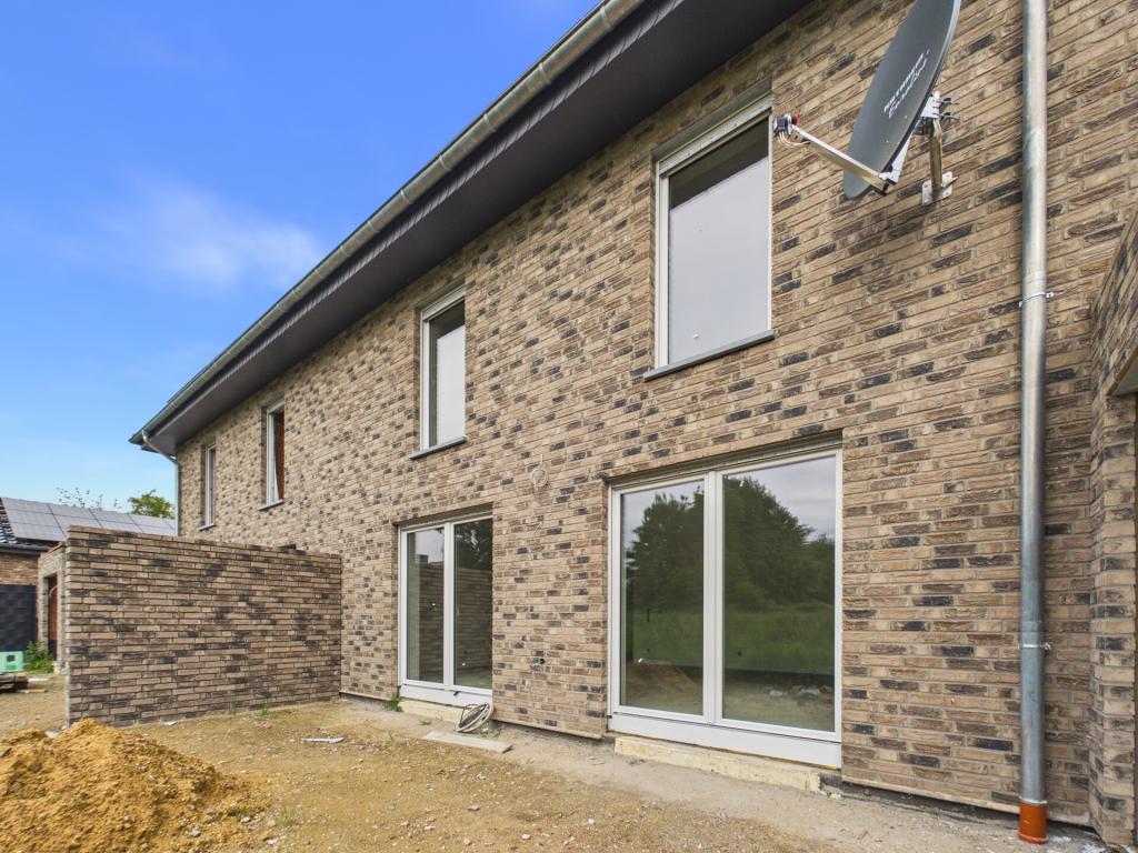 Energieeffizientes Neubauhaus mit Garage und Garten in ruhiger Wohnlage von Langbroich! - Photo 5