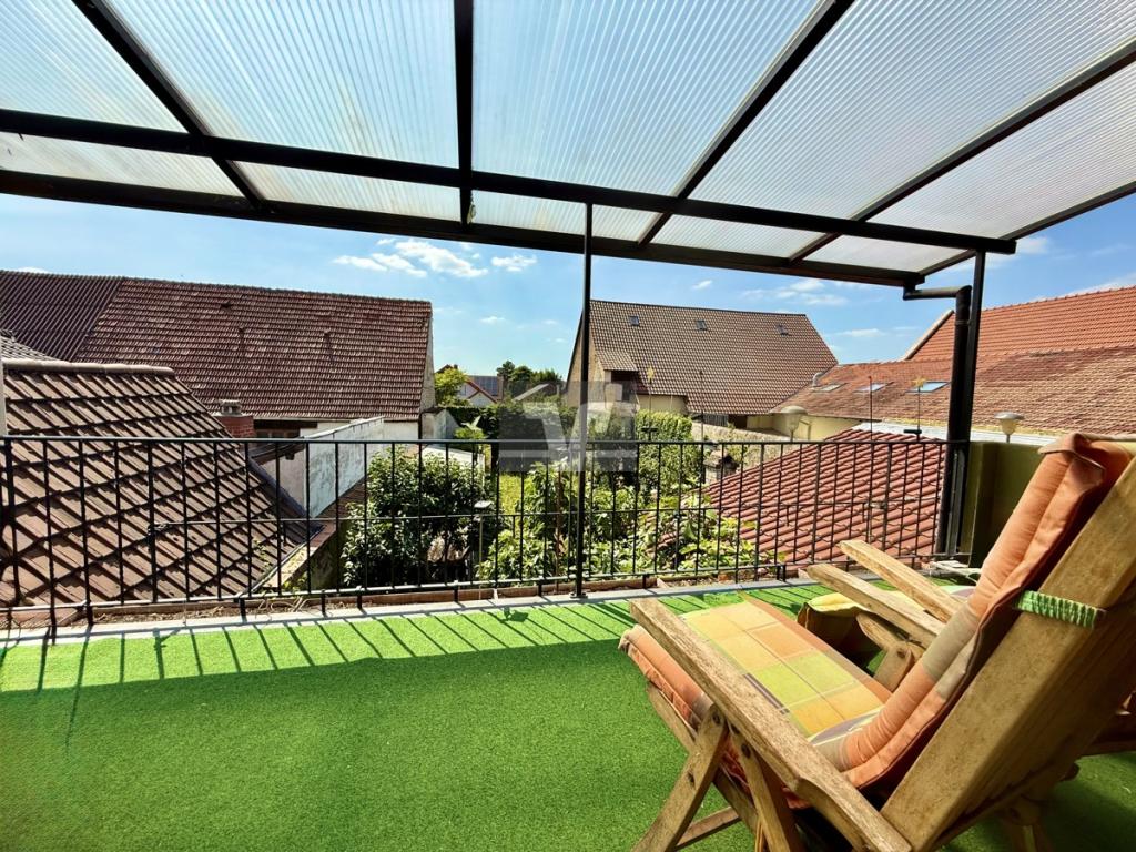 Überdachter Balkon