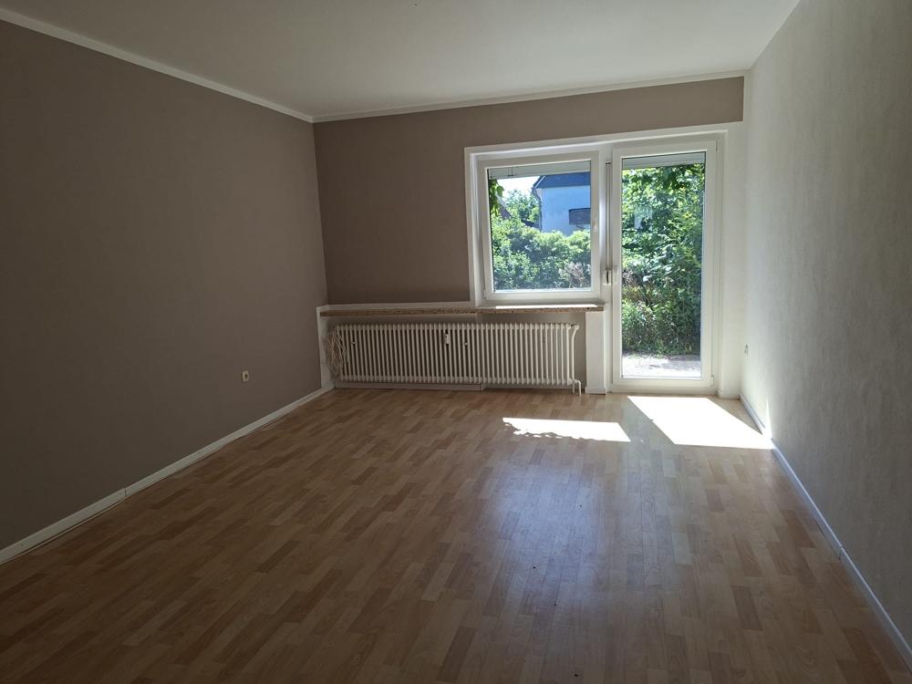 Erdgeschosswohnung mit Garten in Hooksiel - Foto 4