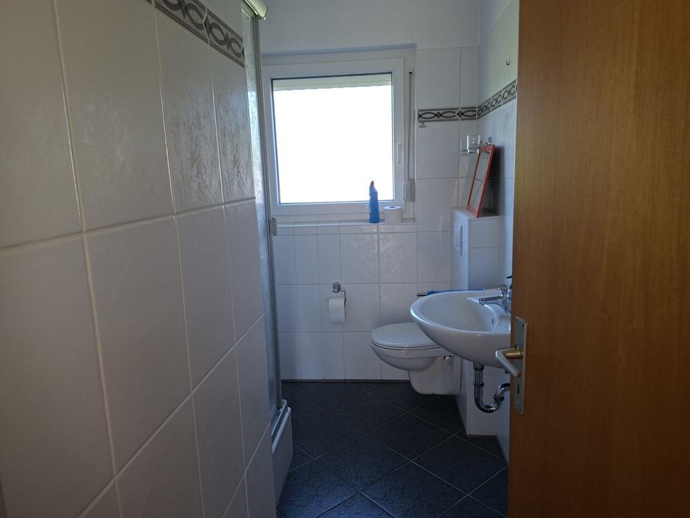 Erdgeschosswohnung mit Garten in Hooksiel - Foto 5