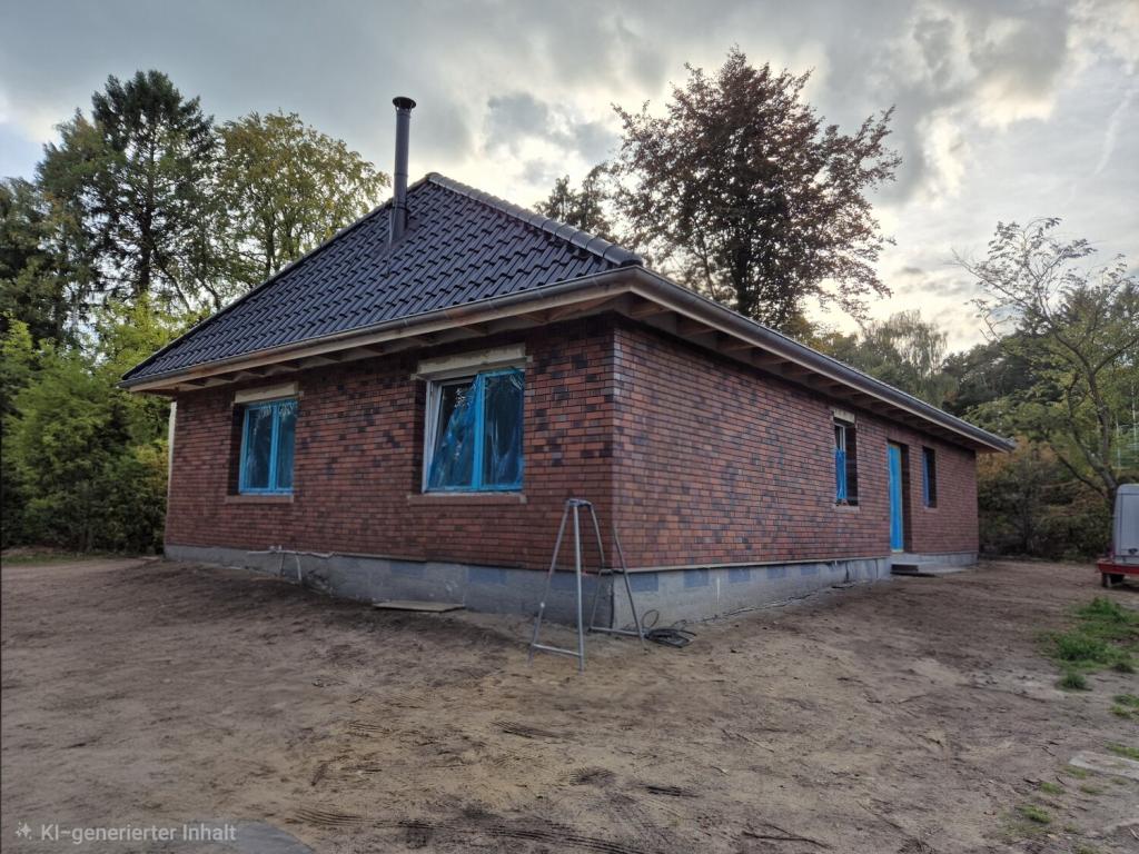 Bungalow mit PV-Anlage und Wärmepumpe in Holm-Seppensen - Photo 2