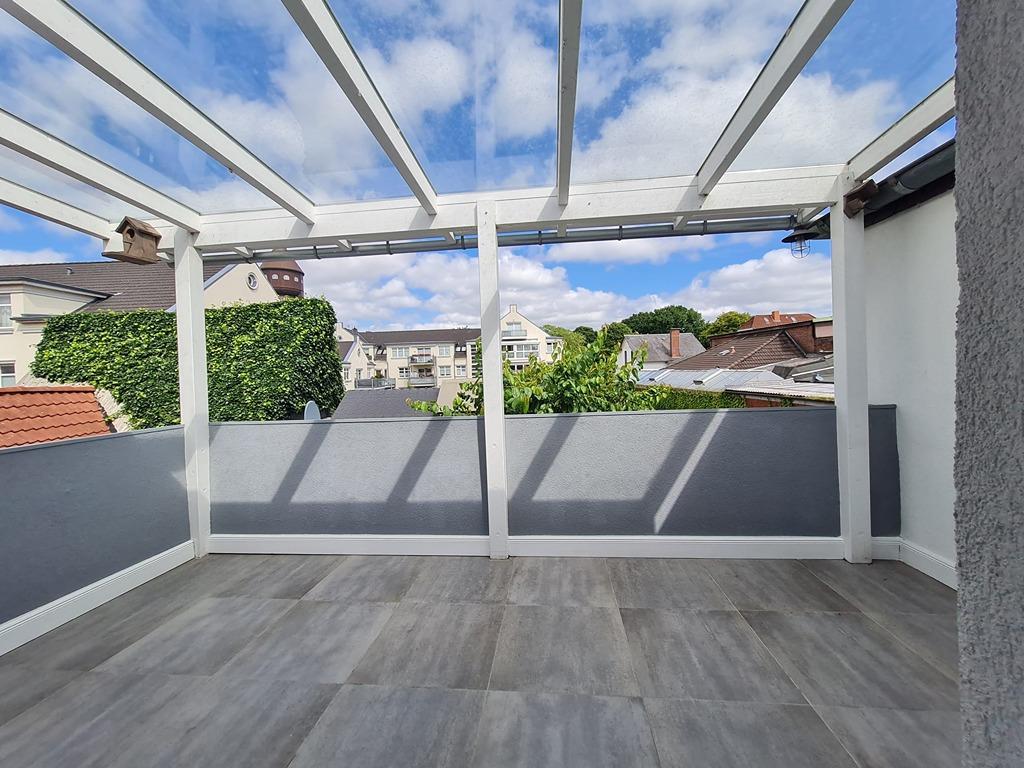 Obergeschoss 11 überdachte Terrasse Foto 1.jpg