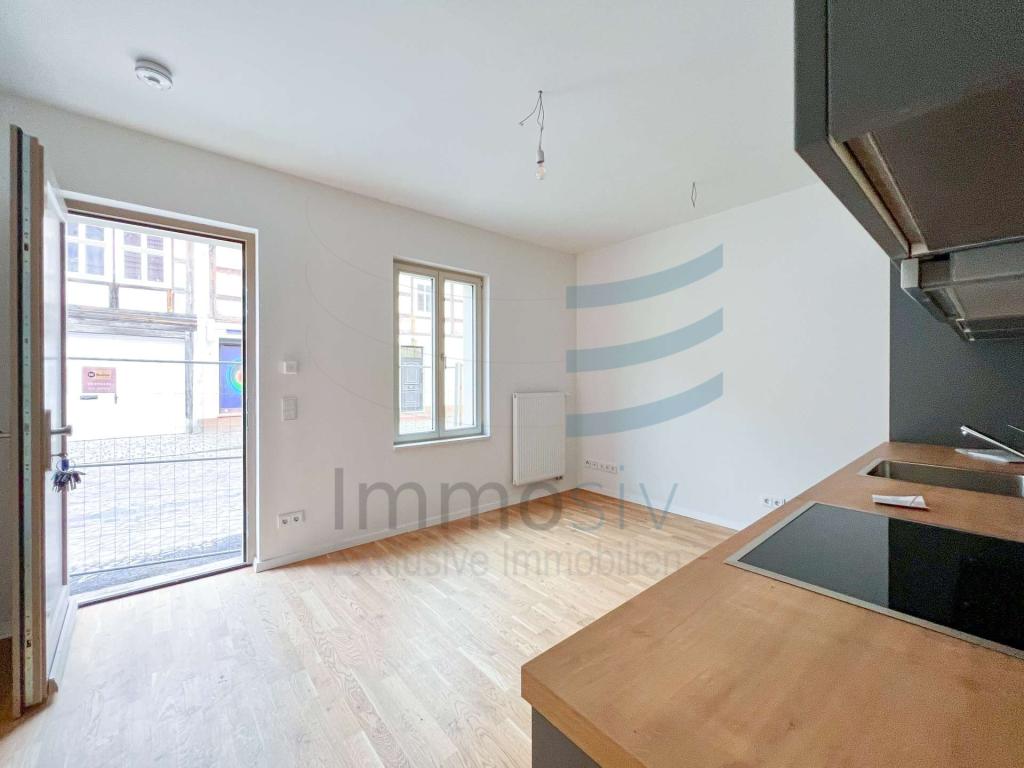 Hübsche Erdgeschosswohnung mit großen Fenstern und schöner Terrasse - Photo 3
