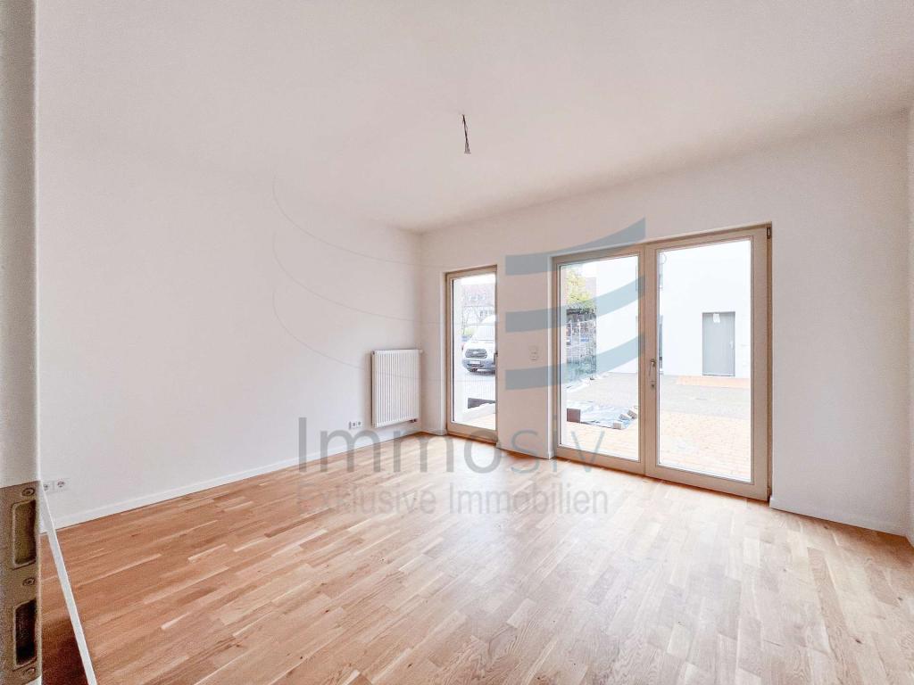 Hübsche Erdgeschosswohnung mit großen Fenstern und schöner Terrasse - Photo 1