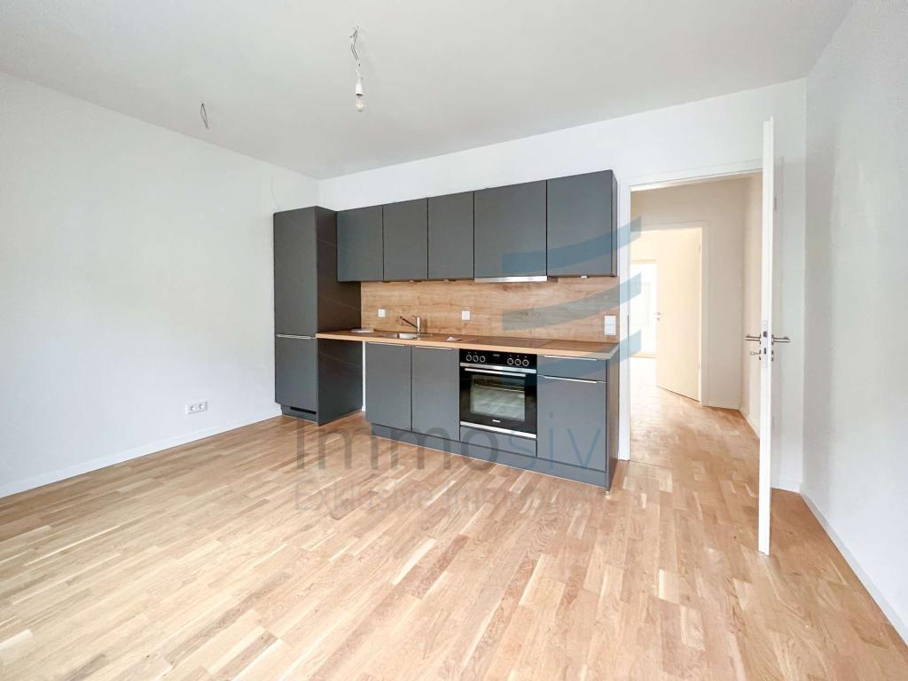 Hübsche Erdgeschosswohnung mit großen Fenstern und schöner Terrasse - Photo 2