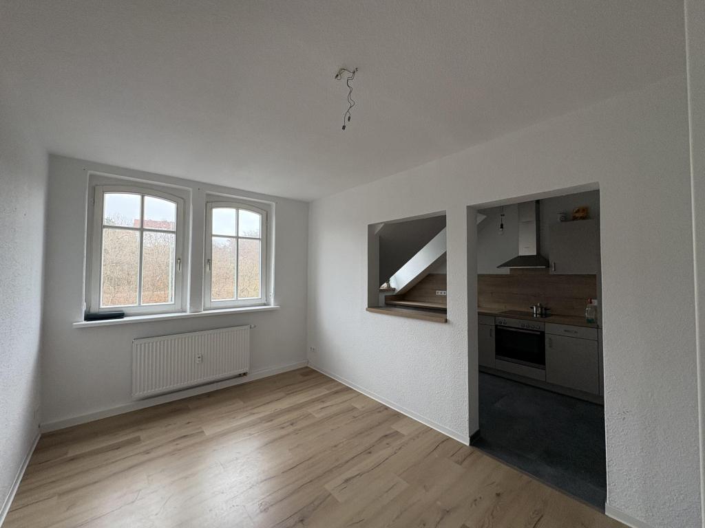 Zentral gelegene Dachgeschosswohnung mit Einbauküche in Zwickau - Foto 1