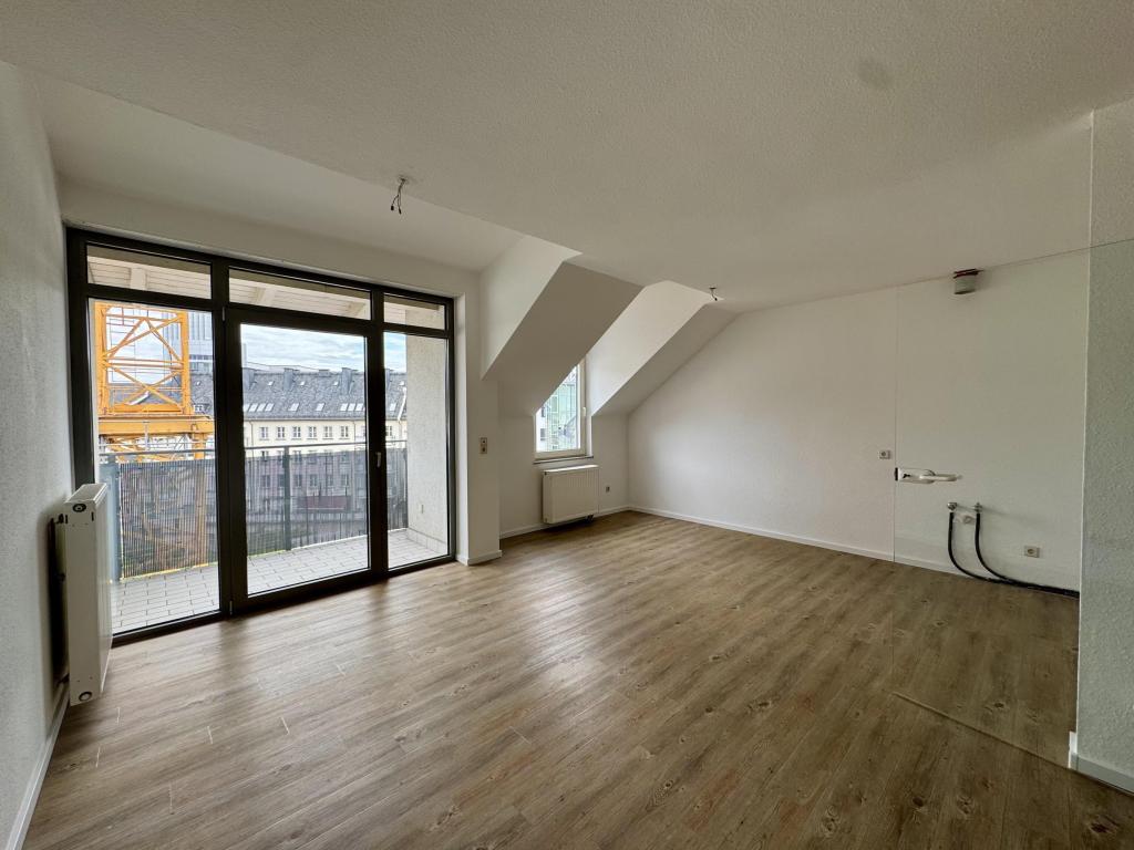 Helle 2-Raum-Wohnung in zentraler Innenstadtlage mit Balkon und Tiefgaragenstellplatz - Photo 1