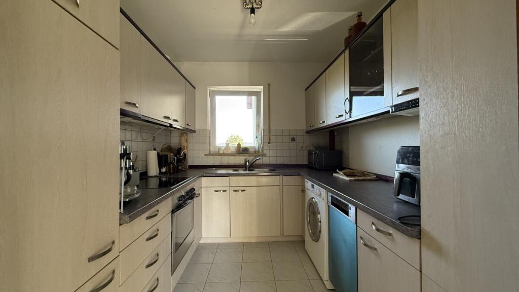 nett 2-Zimmer-Wohnung mit Balkon und Stellplatz ab 01.12. frei - Photo 4