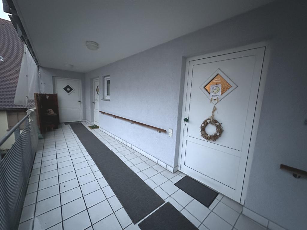 Laubengang und Wohnungszugang