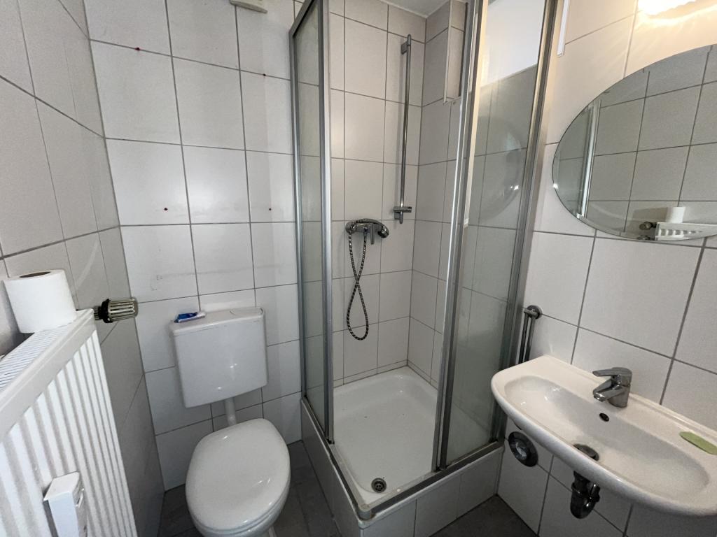 Frisch saniertes 1-Zimmer-Apartment mit großer Terrasse – Ruhige Oase in Innenstadtlage - Photo 5