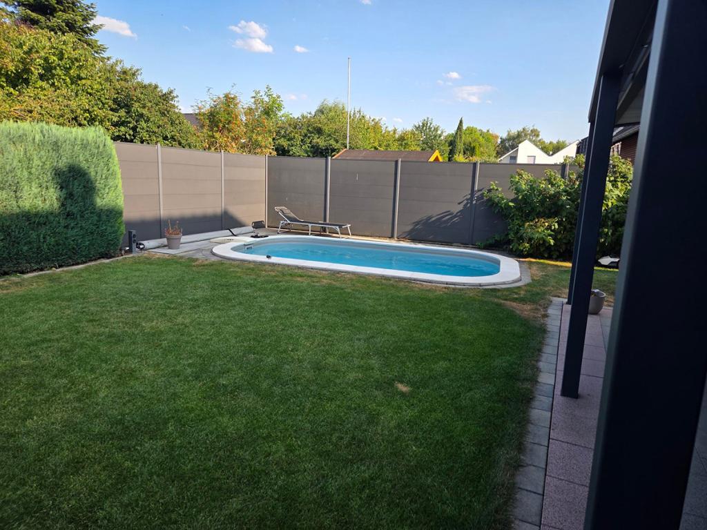 Großzügiges Einfamilienhaus mit Kamin, Sauna, Garage und beheizten Pool im Garten - Foto 4