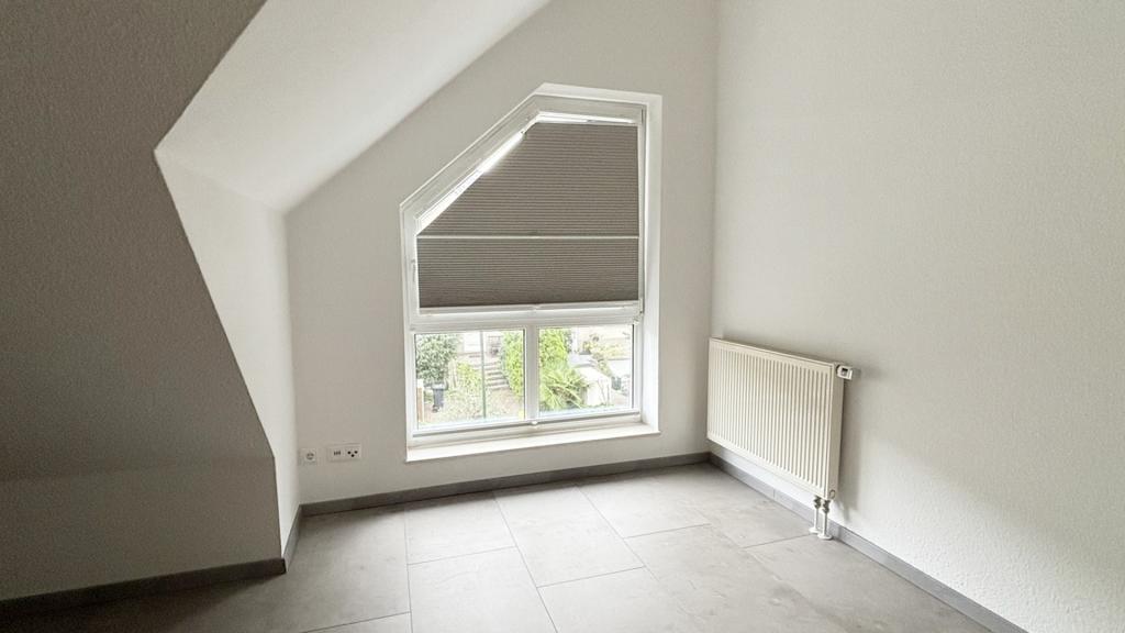 Familienfreundliches Einfamilienhaus in Düsseldorf-Einbrungen! - Photo 4