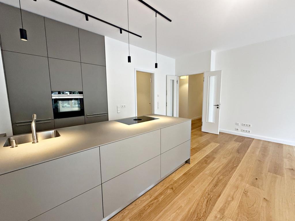 Stilvolle Erdgeschosswohnung mit großer Terrasse in begehrter Lage der Düsseldorfer Altstadt - Foto 3