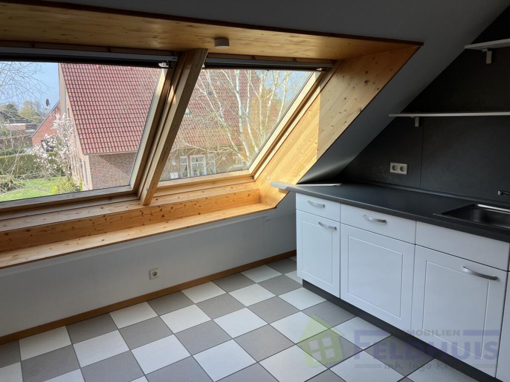 Helle und gemütliche Obergeschosswohnung in ruhiger Sackgassenlage von Warsingsfehn! - Foto 2
