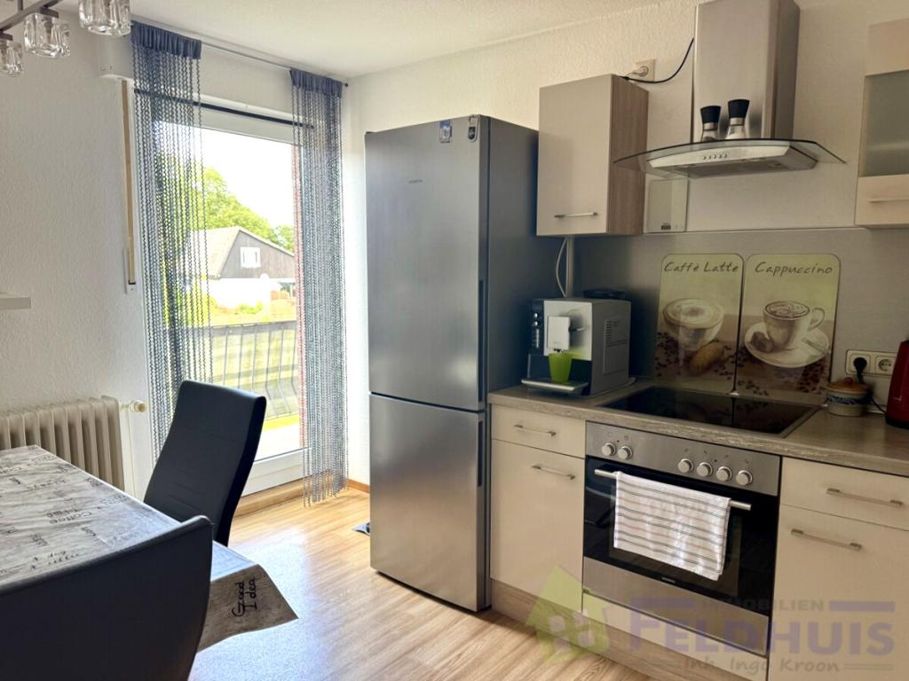 Gemütliche Oberwohnung mit Balkon in ruhiger Lage von Holtland! - Foto 4