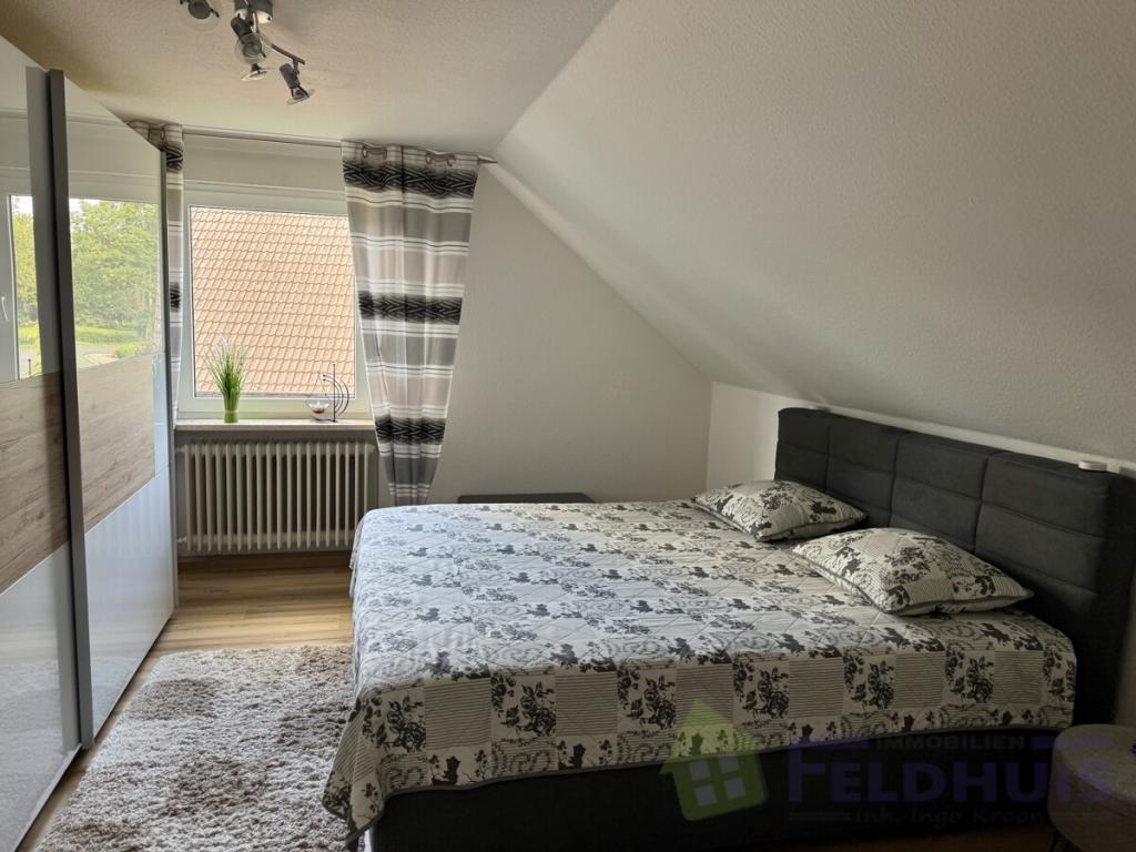 Gemütliche Oberwohnung mit Balkon in ruhiger Lage von Holtland! - Foto 3