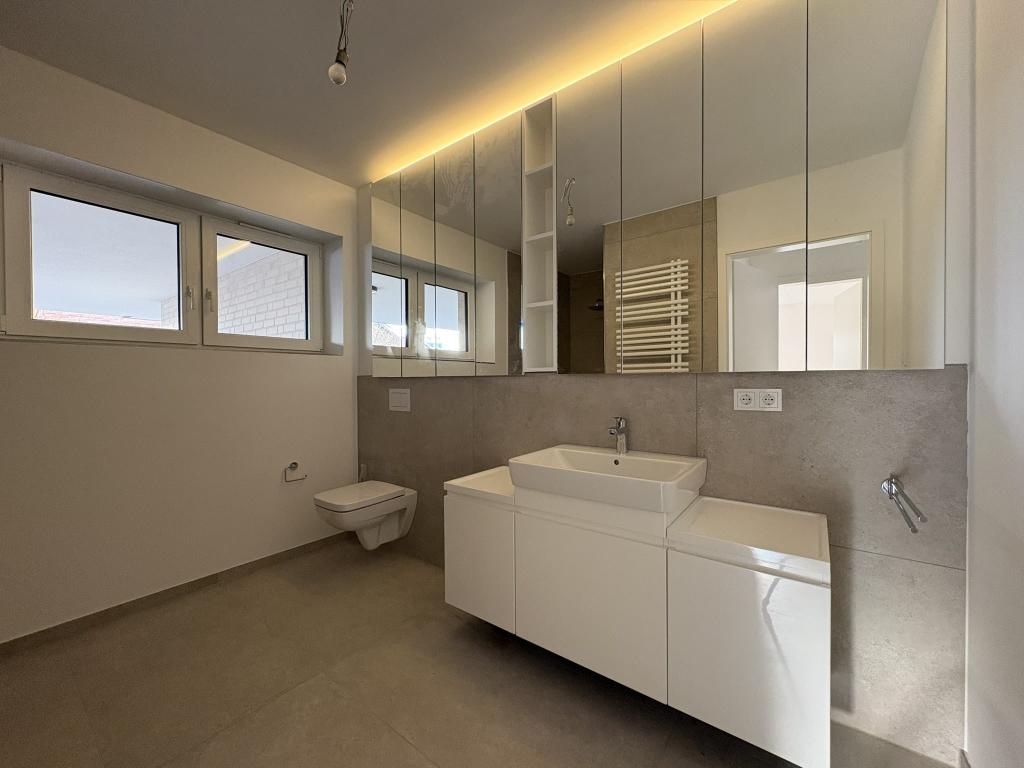 Stilvolle Erdgeschoss-Neubauwohnung mit eigenem Garten in Wiedenbrück - Foto 4