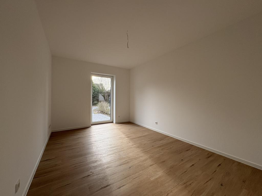 Stilvolle Erdgeschoss-Neubauwohnung mit eigenem Garten in Wiedenbrück - Foto 2