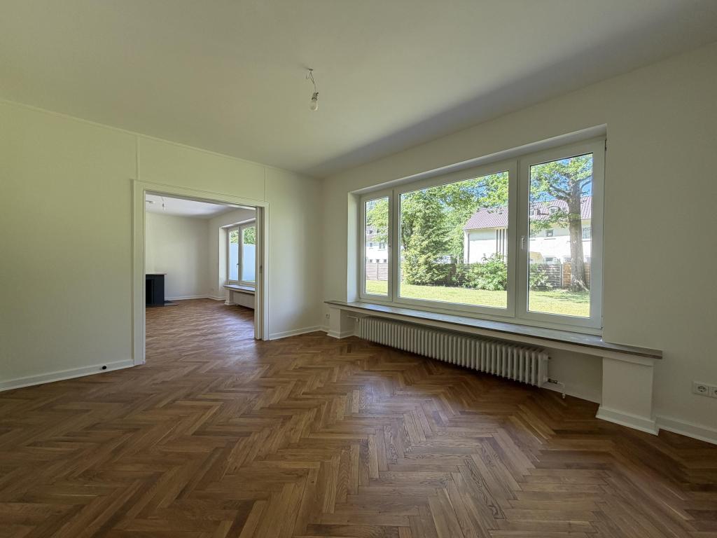 Großzügiges Einfamilienhaus in begehrter Stadtparklage von Gütersloh - Foto 1
