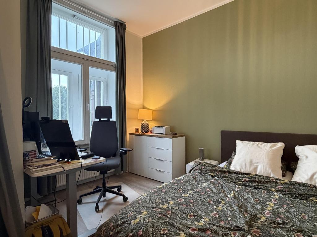 Historischer Charme trifft auf urbanes Wohnen – Stilvolle 2-ZKB-Wohnung in einer Stadtvilla - Photo 4
