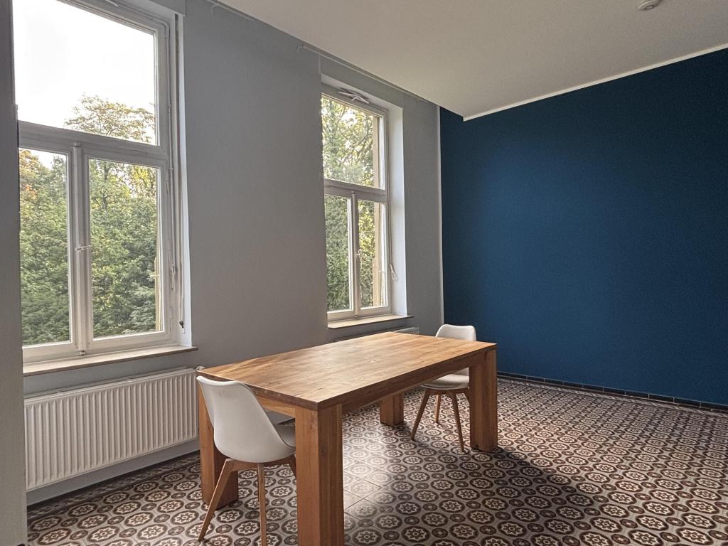 Historischer Charme trifft auf urbanes Wohnen – Stilvolle 2,5-ZKB-Wohnung in einer Stadtvilla - Photo 4