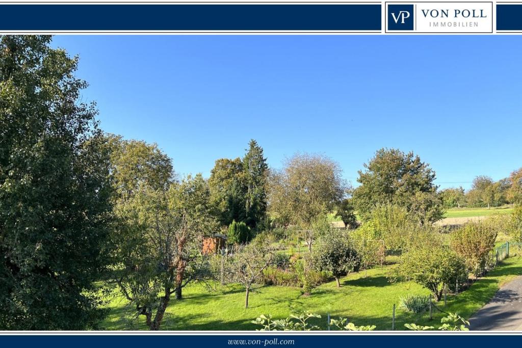 Freistehendes Einfamilienhaus für vielseitige Wohnkonzepte in ruhiger Feldrandlage