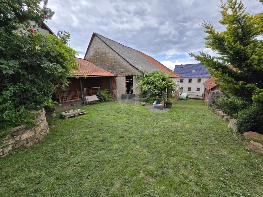 hinteres Gartengrundstück mit Sitzplatzbereich