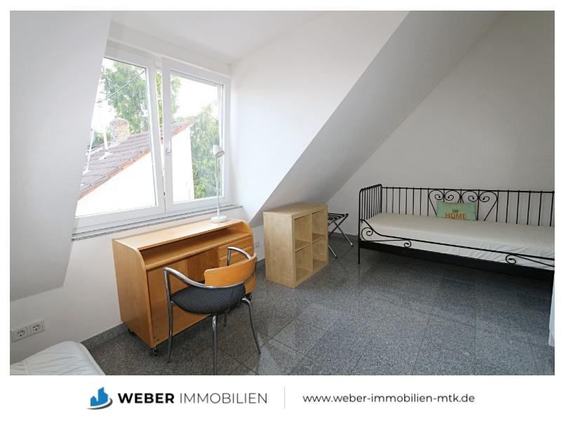 Fully furnished, modern and light-filled top-floor apartment in a quiet, green residential area - Photo 4