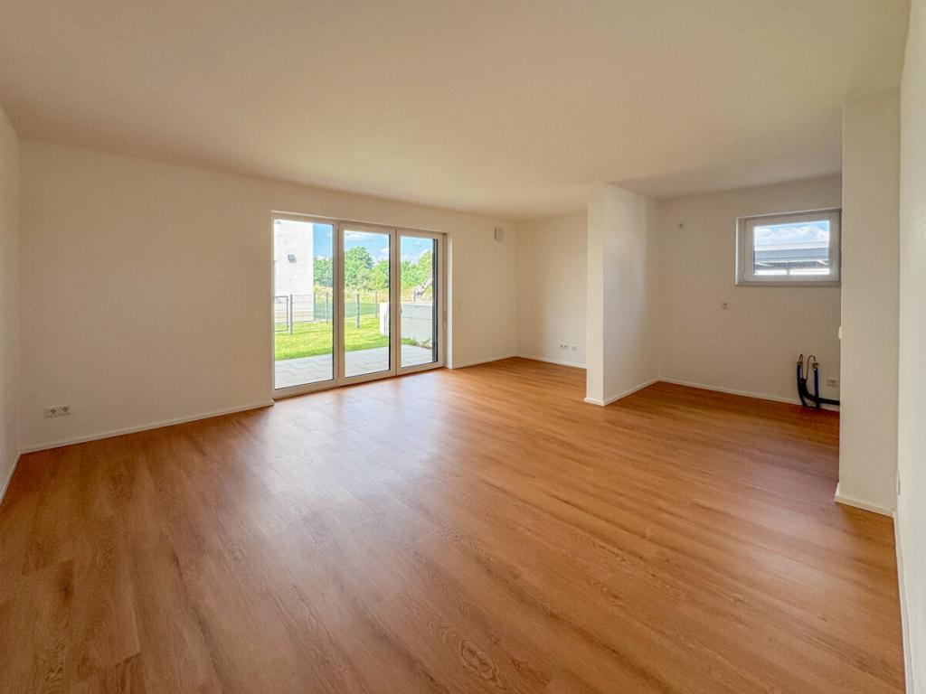 Attraktiver Erstbezug: Stilvolle 3-Zimmer-Wohnung mit Gartenanteil - Photo 1