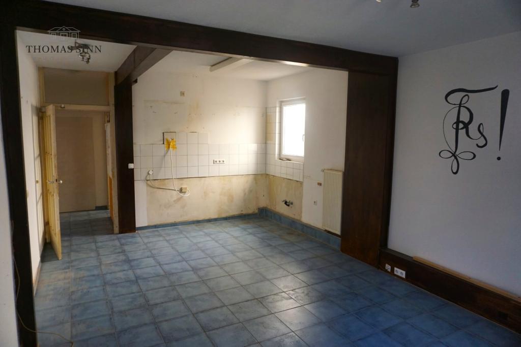 EG: Wohn-/Esszimmer mit Küchenanschlüsse