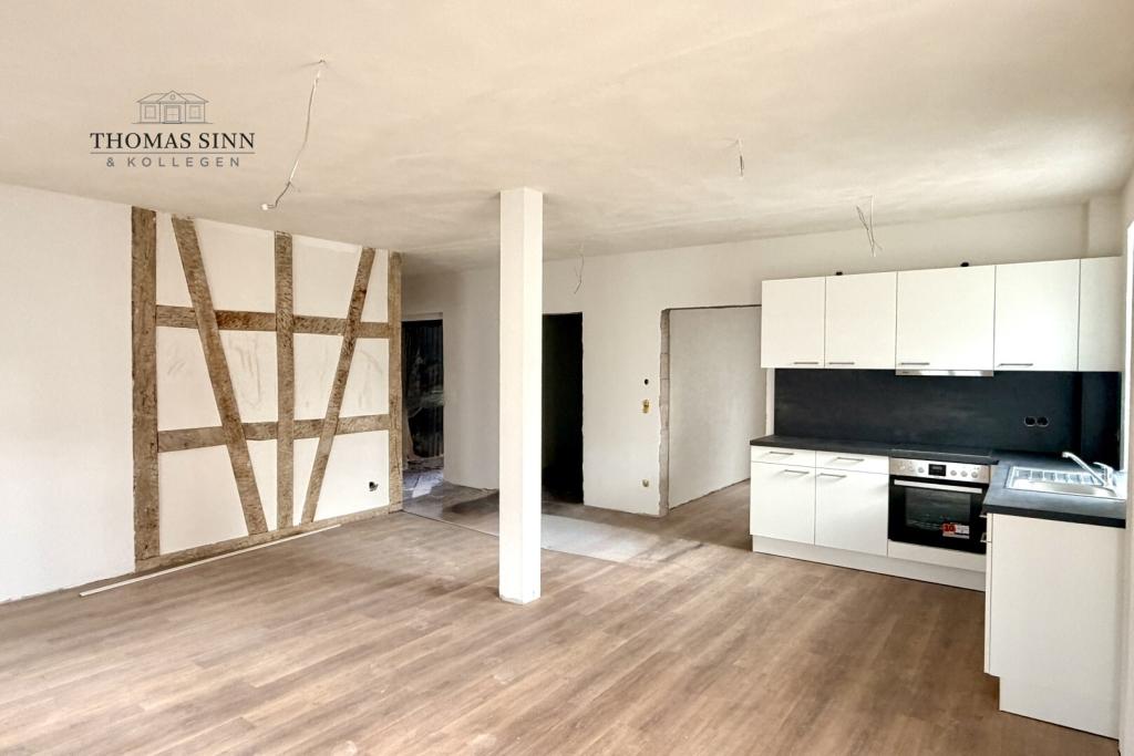 Charmante 3,5-Zimmer Hochparterre-Wohnung mit Terrasse & Fachwerkflair im kernsanierten Denkmal - Foto 2