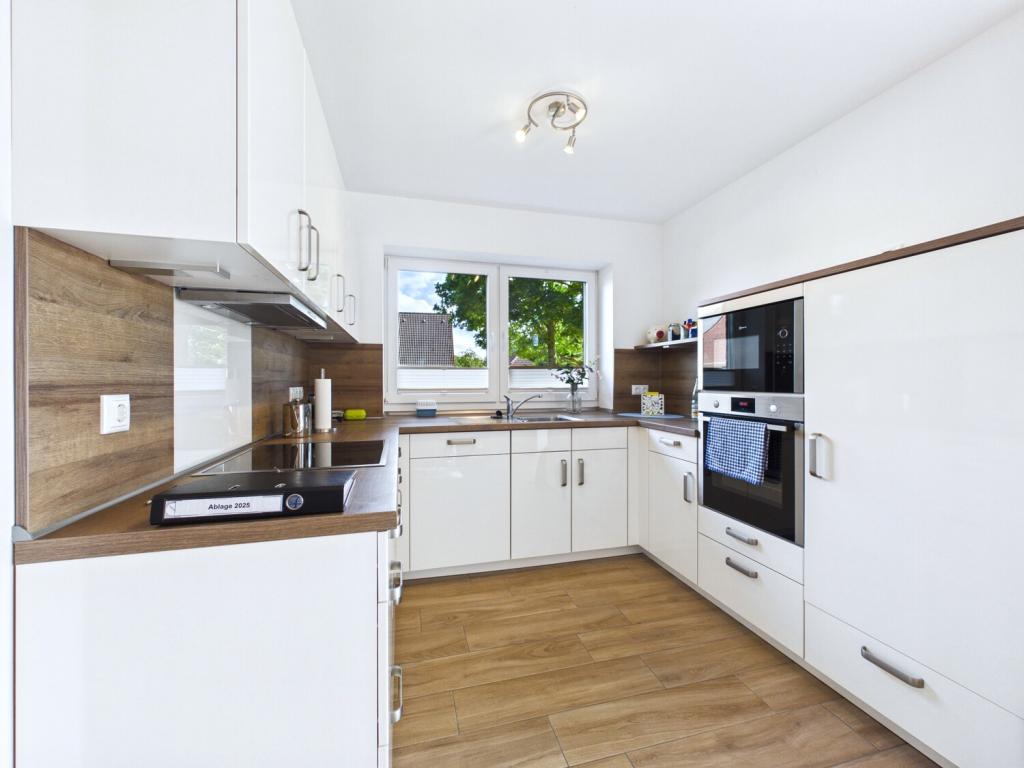 Neuwertiger Bungalow auf großem Grundstück mit Garage in Aurich-Schirum - Photo 5