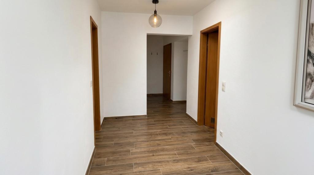 Hell und freundlich! Großzügige DG-Wohnung mit Loggia & Weitblick - Photo 5