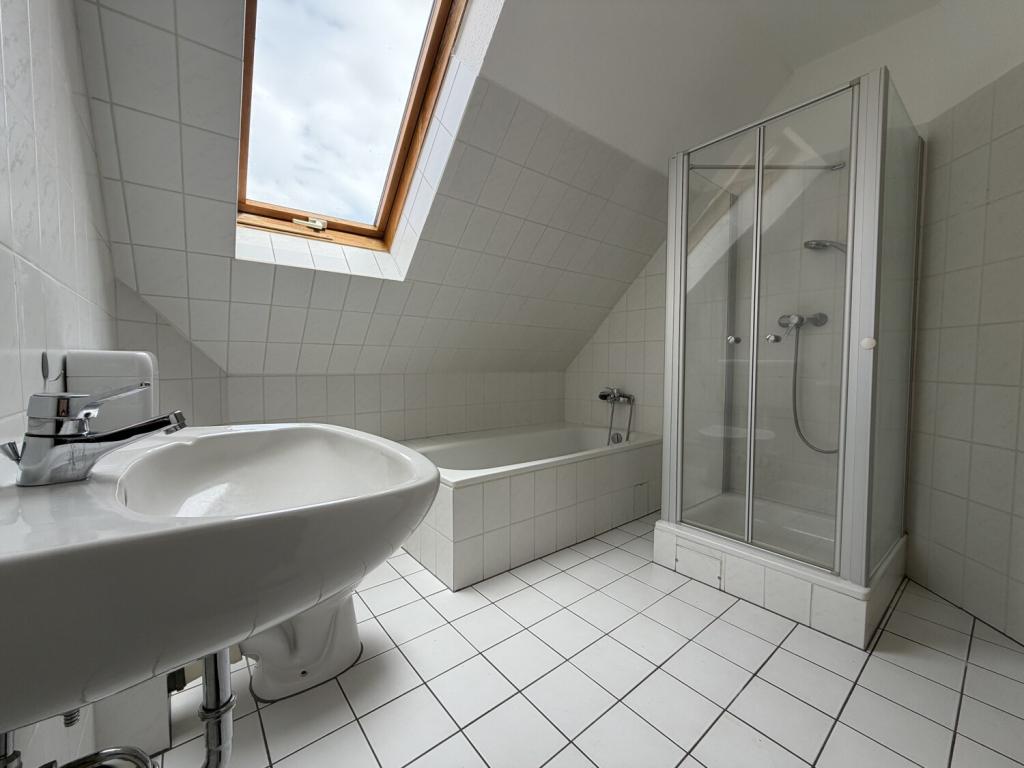 Charmante Dachgeschosswohnung mit hoher Lebensqualität - Foto 1