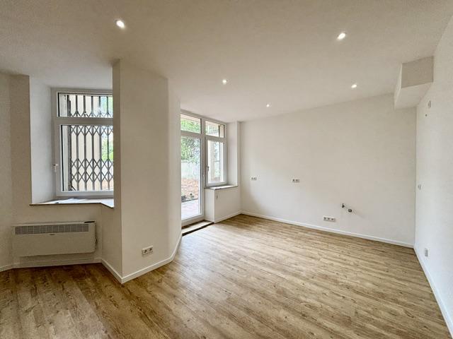 Erstbezug nach Sanierung: 2-Zimmer-Wohnung mit Garten direkt am Oberkasseler-Rheinufer - Foto 1