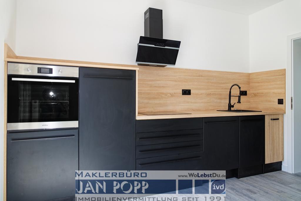 Erstbezug nach Sanierung mit Einbauküche und Südbalkon - Foto 1