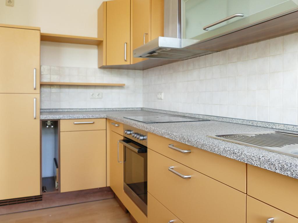 Zwei Etagen, Einbauküche und Gartenterrasse - Foto 3